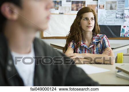 Female high school student in class View Large Photo Image Picture - Female high school student in class. Fotosearch