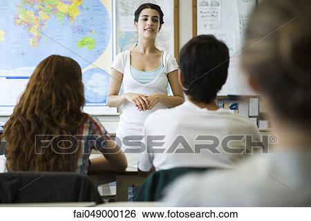 Female high school student speaking to class View Large Photo Image Stock Photograph - Female high school student speaking to class. Fotosearch