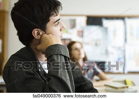 High school student daydreaming in class View Large Photo Image Stock Photograph - High school student daydreaming in class. Fotosearch