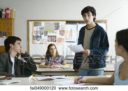 High school student giving presentation in class View Large Photo Image Stock Image - High school student giving presentation in class. Fotosearch
