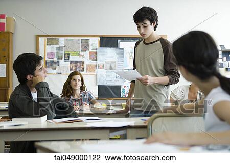 High school student giving presentation in class View Large Photo Image Stock Image - High school student giving presentation in class. Fotosearch