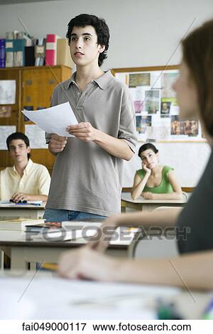 High school student reading report to class View Large Photo Image Stock Photo - High school student reading report to class. Fotosearch