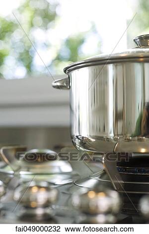 Pot cooking on gas stove View Large Photo Image Stock Image - Pot cooking on gas stove. Fotosearch