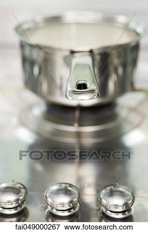 Pot cooking on stove View Large Photo Image Stock Photo - Pot cooking on stove. Fotosearch