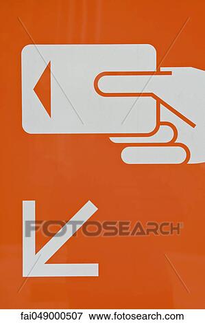 Stock Photo - Sign indicating correct use of credit card reader. Fotosearch