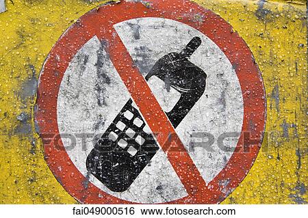 Sign prohibiting use of cell phones View Large Photo Image Stock Photograph - Sign prohibiting use of cell phones. Fotosearch