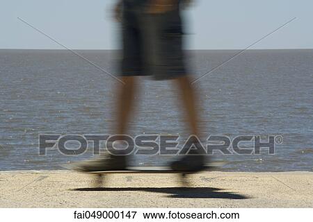 Skateboarding at seaside park View Large Photo Image Stock Photo - Skateboarding at seaside park. Fotosearch