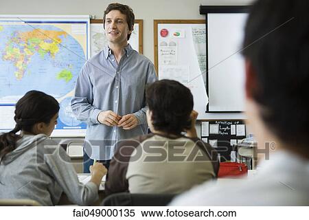 Teacher teaching high school class View Large Photo Image Stock Photography - Teacher teaching high school class. Fotosearch
