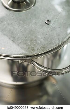 Water boiling in pot View Large Photo Image Stock Image - Water boiling in pot. Fotosearch