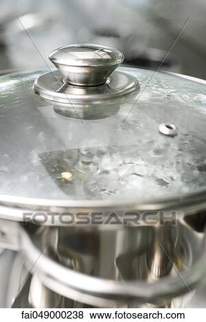 Water boiling in pot View Large Photo Image Stock Photo - Water boiling in pot. Fotosearch