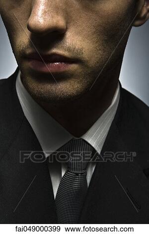 Well-dressed young man, cropped View Large Photo Image Stock Photo - Well-dressed young man, cropped. Fotosearch