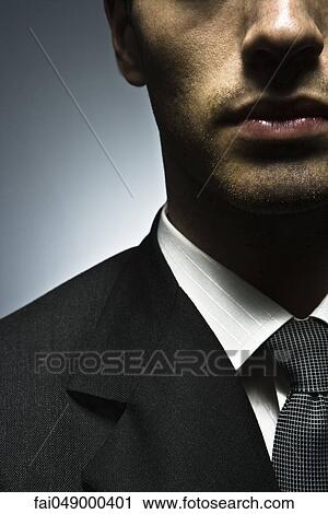 Young man in business attire View Large Photo Image Stock Image - Young man in business attire. Fotosearch