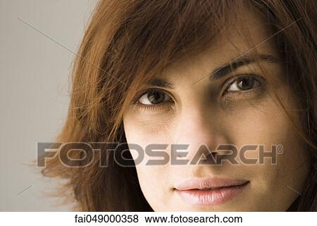 Young woman, close-up View Large Photo Image Stock Photo - Young woman, close-up. Fotosearch