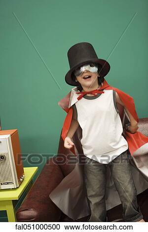 Boy in costume pretending to be magician View Large Photo Image Stock Image - Boy in costume pretending to be magician. Fotosearch