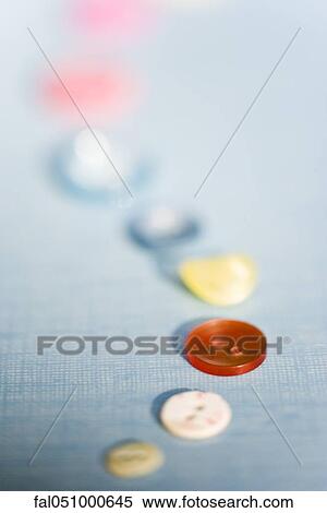 Stock Photography - Buttons arranged in a row. Fotosearch