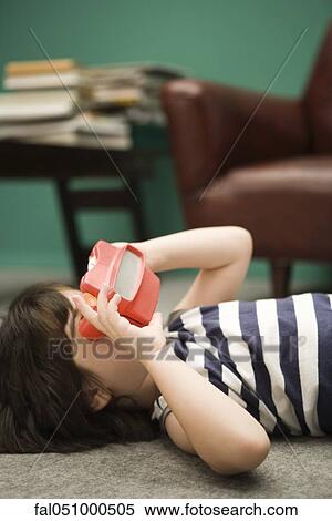 Child looking through toy viewfinder View Large Photo Image Stock Photography - Child looking through toy viewfinder. Fotosearch
