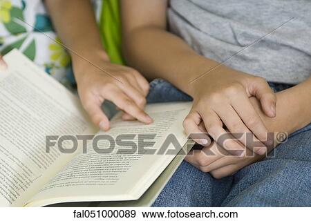Children reading together View Large Photo Image Stock Photo - Children reading together. Fotosearch
