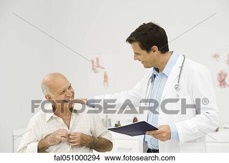 Doctor with senior patient View Large Photo Image Picture - Doctor with senior patient. Fotosearch