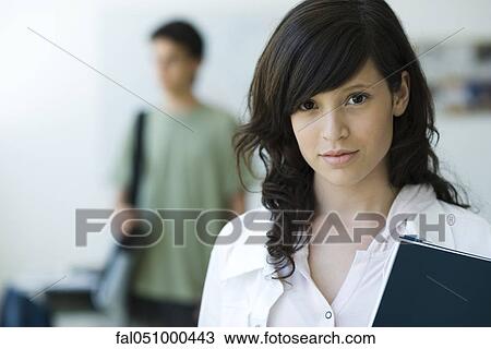 Stock Image - Female high school student, portrait. Fotosearch