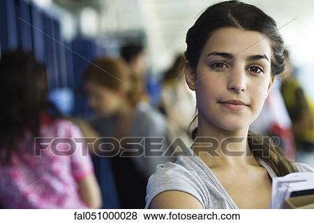 Stock Photo - Female high school student, portrait. Fotosearch