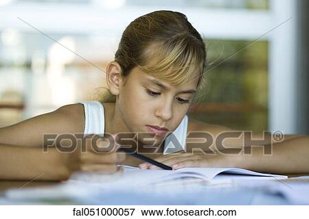 Female junior high student studying View Large Photo Image Stock Photo - Female junior high student studying. Fotosearch