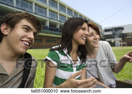 High school friends hanging out together, pointing and laughing View Large Photo Image Stock Image - High school friends hanging out together, pointing and laughing. Fotosearch