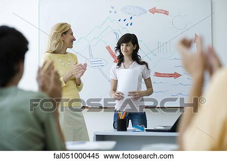 High school student finishing classroom presentation, students and teacher clapping View Large Photo Image Stock Photography - High school student finishing classroom presentation, students and teacher clapping. Fotosearch