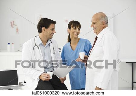 Medical professionals together on break View Large Photo Image Stock Image - Medical professionals together on break. Fotosearch