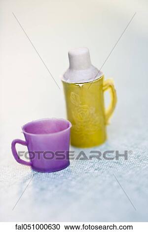 Miniature cup and thermos View Large Photo Image Stock Image - Miniature cup and thermos. Fotosearch