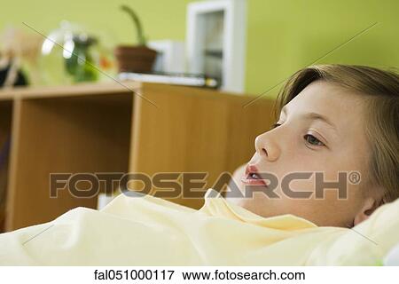 Preteen boy daydreaming View Large Photo Image Stock Photo - Preteen boy daydreaming. Fotosearch