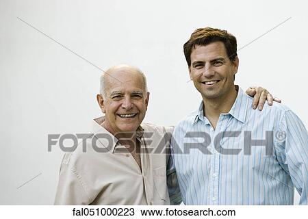 Senior man with adult son, portrait View Large Photo Image Stock Image - Senior man with adult son, portrait. Fotosearch