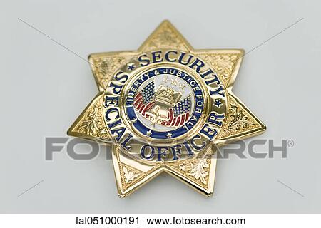 Stock Image - Special Security Officer brass badge. Fotosearch