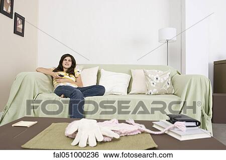 Teenage girl watching TV View Large Photo Image Stock Photograph - Teenage girl watching TV. Fotosearch