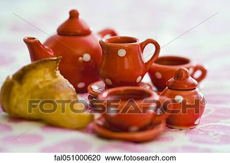 Toy tea set with pastry View Large Photo Image Stock Image - Toy tea set with pastry. Fotosearch