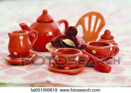 Toy tea set with pastry View Large Photo Image Stock Photo - Toy tea set with pastry. Fotosearch