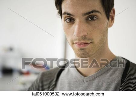 Stock Image - Young man, portrait. Fotosearch