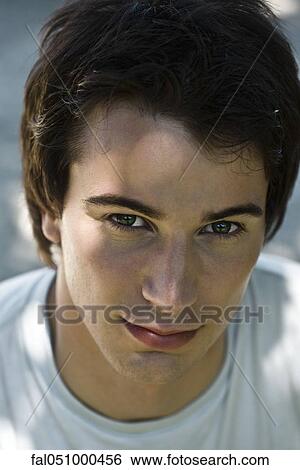Stock Photograph - Young man, portrait. Fotosearch