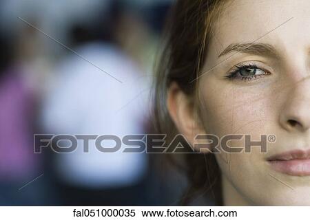 Young woman, close-up, cropped View Large Photo Image Stock Photography - Young woman, close-up, cropped. Fotosearch