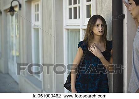 Young woman in serious conversation with boyfriend View Large Photo Image Stock Image - Young woman in serious conversation with boyfriend. Fotosearch