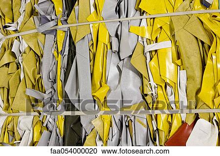 Stock Image - Bales of PVC sheeting to be recycled. Fotosearch