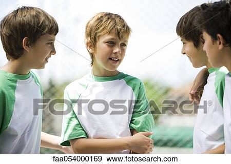 Boys chatting outdoors View Large Photo Image Stock Photo - Boys chatting outdoors. Fotosearch