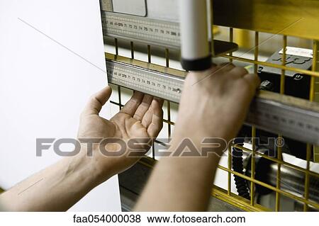 Fabric coating plant, machinist working on production line View Large Photo Image Stock Photo - Fabric coating plant, machinist working on production line. Fotosearch