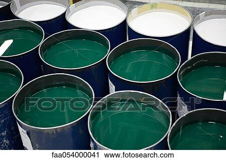 Stock Image - Fabric coating plant, metal drums containing a liquid plasticizer used for coating textiles. Fotosearch