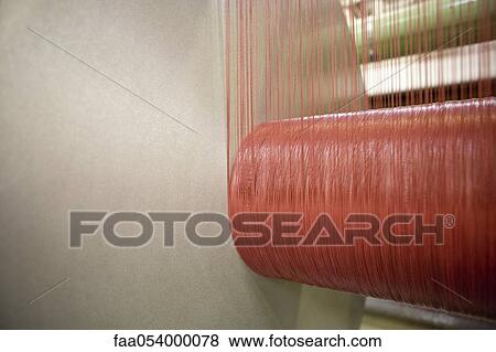 Fabric coating plant, recyclable composite textile weaving department, loom, weaver's beam View Large Photo Image Stock Photo - Fabric coating plant, recyclable composite textile weaving department, loom, weaver's beam. Fotosearch
