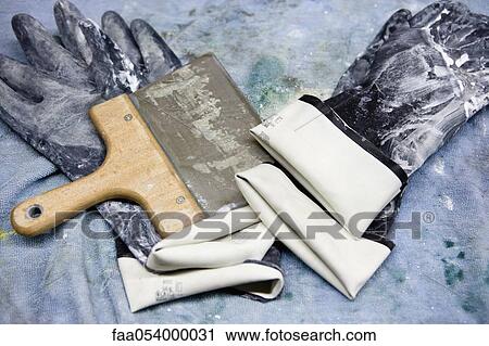 Fabric coating plant, rubber gloves and squeegee View Large Photo Image Stock Image - Fabric coating plant, rubber gloves and squeegee. Fotosearch