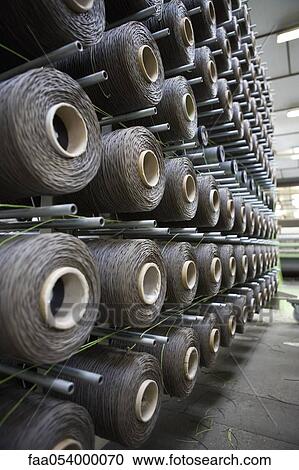 Fabric coating plant, weaving department, unwinding creel View Large Photo Image Stock Image - Fabric coating plant, weaving department, unwinding creel. Fotosearch