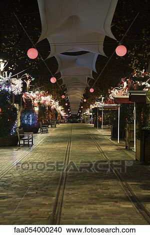 Stock Image - France, Paris, Bercy Village at night. Fotosearch