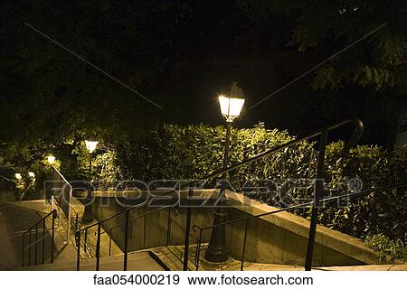 France, Paris, Montmartre, stairs lit by street lamps at night View Large Photo Image Stock Photo - France, Paris, Montmartre, stairs lit by street lamps at night. Fotosearch
