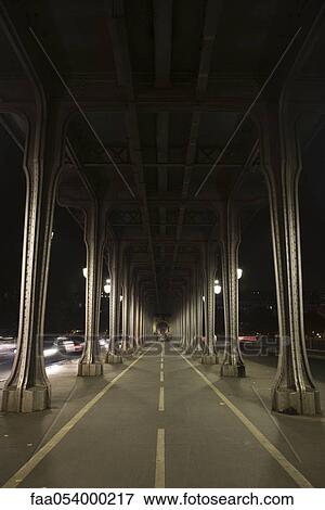 Stock Photo - France, Paris, Pont Bir Hakeim at night. Fotosearch