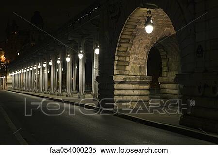 Stock Photography - France, Paris, Pont Bir Hakeim bridge at night. Fotosearch